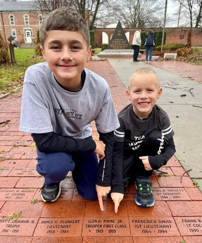 These young boys found their Grandfather’s name at the Tom Ingram Walk of Honor.